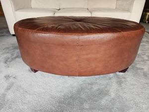 lot 39 image: Chocolate Brown Leather Oval  Ottoman