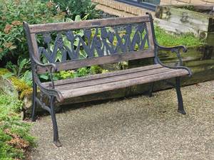 lot 47 image: Charming Iron Garden Bench with Tulip Design