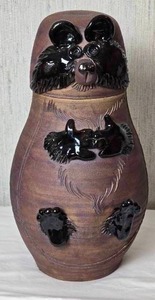 lot 74 image: Adorable Handmade Ceramic Raccoon Cookie Jar