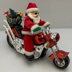 lot 46 image: Vintage Kmart Dandee Musical Light-Up Motorcycle Santa Claus Animated (SOME FUNCTIONS WORK) Plays Music Doesnt Light-Up Or Rock Back And Forth