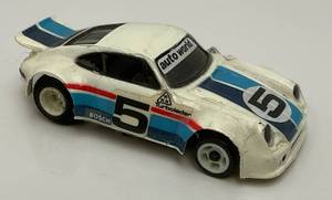 lot 60 image: Vintage AFX Turbo Porsche HO Scale Slot Car (Brushes Missing) Available In Lot 74