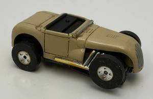 lot 62 image: Vintage 1963 HO Tan Hot Rod Roadster Thunderjet 500 Slot Car