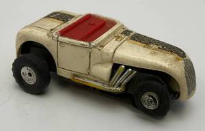lot 67 image: Vintage 1963 HO White Hot Rod Roadster Thunderjet 500 Slot Car