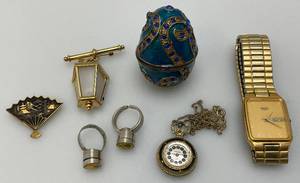 lot 78 image: Misc. Vintage Watches, Tie Clip, And Light Up Rings Including Seiko Mens Watch & More