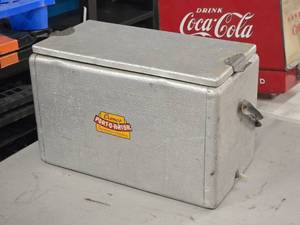 lot 338 image: Vintage Cronco Port-o-rator logo Metal Chest Cooler