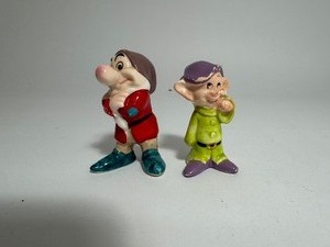 lot 13 image: Vintage Disney Two of the Seven Dwarfs Pottery Figures