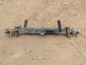 lot 20 image: Small 4 WheelerLawn Tractor Front Axel - 4 Bolt Hubs