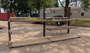 lot 26 image: Large Heavy Duty LumberSteel Rack - 8 Tall x 17 Long - 4 bottom shelf all other shelves 3 - 14-16k #s of steel was stored on it.