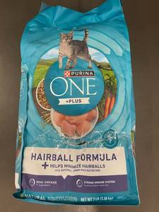 lot 129 image: Purina ONE Hairball Formula Cat Food, 7 lb Bag, Best by Aug 2025