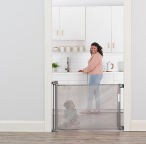 lot 231 image: Regalo Retractable Baby Gate, Expands Wide
