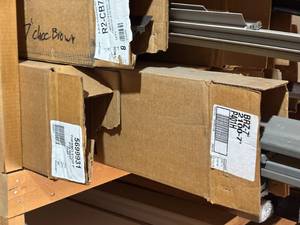 lot 554 image: Garage Door Stop, Slotted Angle Iron, Brick Mold,