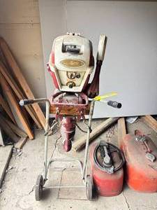 lot 579 image: Johnson Outboard motor and gas tanks