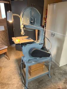 lot 14 image: Delta Band Saw Model 28-243 with Adjustable Stand and Spare Blades