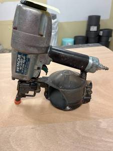 lot 29 image: Hitachi NV 65AH 2 12 Inch Coil Nailer