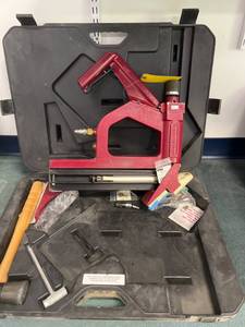 lot 65 image: Porta-Nails Portamatic Model 421 Pneumatic Floor Nailer with Case