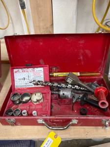 lot 78 image: Red Metal Drill Accessory Kit with Assorted Bits and Hole Saws