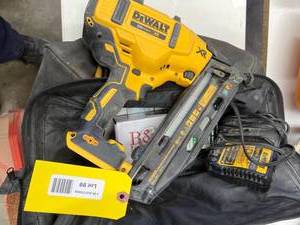 lot 99 image: DeWalt DCN660 16GA Cordless Angled Finish Nailer with Bag and Charger