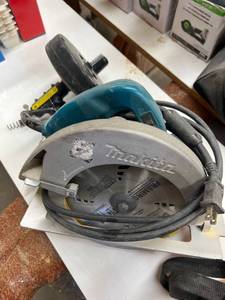 lot 111 image: Makita 5007FA Circular Saw and Drill-Powered Canister Auger