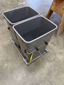 lot 115 image: Dual Gray Pull-Out Trash Bins with Metal Sliding Frame