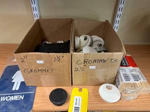 lot 132 image: Grommets, Shims, and Womens Restroom Sign