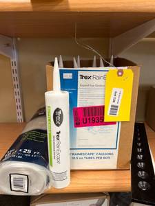 lot 136 image: Trex RainEscape Caulking, Plastic Covering, and Metal Parts Lot