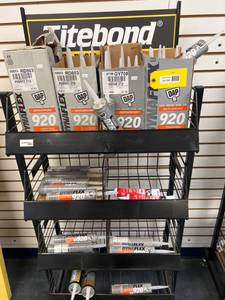 lot 184 image: Caulk and Sealant Tubes with Display Rack