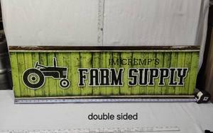 lot 25 image: JM Cremps Farm Supply Double-Sided Sign Approx. 14x44