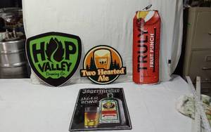 lot 42 image: Beer Advertising Signs including Hop Valley Brewing Co., Two Hearted Ale, Truly Fruit Punch, and Jgermeister