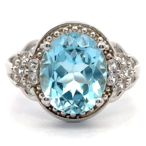 lot 40 image: 4.85 Carat Oval Cut Blue Topaz & White Topaz Cluster Halo Split Shank Ring VIDEO