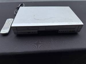lot 7 image: Insignia DVD VCR Combo Player with Remote Model IS-DVDVCR4