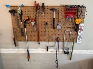 lot 10 image: Garage Hand Tool Collection with Socket Set, Hammers, Saws, and Accessories