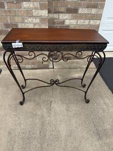 lot 25 image: Metal and Wood Console Table with Ornate Design 32x35x13 Inches