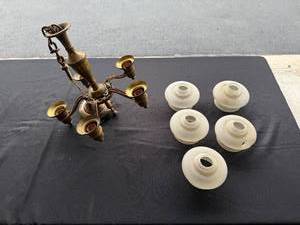 lot 29 image: Vintage 1936 Five Arm Brass Chandelier with Frosted Glass Shades - one globe has a hole