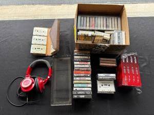 lot 34 image: Audio Collection with Cassettes, New VHS Tapes, Headphones, and Storage Cases
