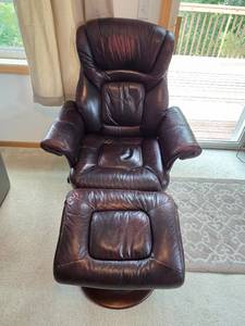 lot 52 image: True Innovations Brown Leather Recliner Chair with Ottoman