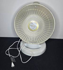 lot 96 image: Presto HeatDish Plus Footlight Parabolic Electric Heater
