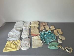 lot 117 image: Vintage Baby Clothing and Diaper Collection with Accessories