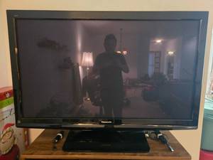 lot 142 image: Panasonic TC-54PS14 54-Inch Plasma HDTV with Remote and Manuals