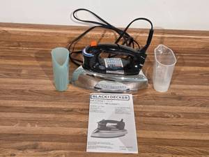 lot 171 image: BlackDecker F67E Classic Steam Iron with 2 Measuring Cups and Manual