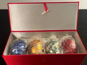 lot 193 image: Joan Rivers Set of 4 Glass Egg Ornaments in Red Box
