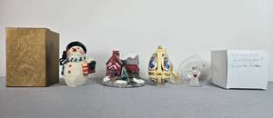 lot 228 image: Holiday Ornament Collection with Musical Egg, Glass Angel, Snowman, and Village House