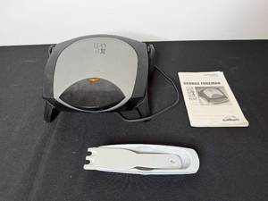 lot 242 image: George Foreman Lean Mean Fat Reducing Grilling Machine GR14 with Manuals and Accessories