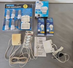 lot 262 image: Assorted LED Nightlights, Light Bulbs, and Phonex Broadband Accessories - quantities unverified