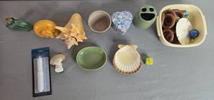 lot 299 image: Eclectic Decor and Collectibles Lot with Shells, Ceramic, and Candle