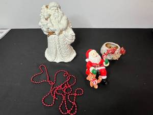 lot 343 image: Christmas Decor Collection with Santa Figurines and Cardinal Tealight Holder