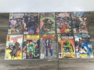 lot 218 image: Lot of 10 Marvel Comic Books - The Rawhide Kid - The Last Statfighter - The Punisher - Spider-Man - The New Warriors - Indiana Jones - Star Trek