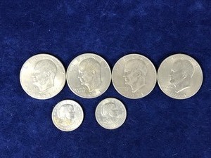 lot 304 image: 4 - Ike Eisenhower One Dollar Coins & 2 Susan B Anthony Coins - see description for more info