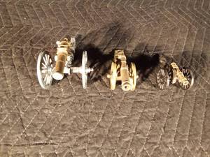 lot 56 image: 2 brass and 1 cast cannon replicas