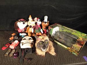 lot 53 image: Plush disney characters and 2 halloween masks