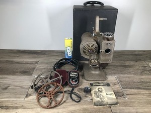 lot 427 image: Vintage Revere 8mm Projector Model 85 with Case and Accessories